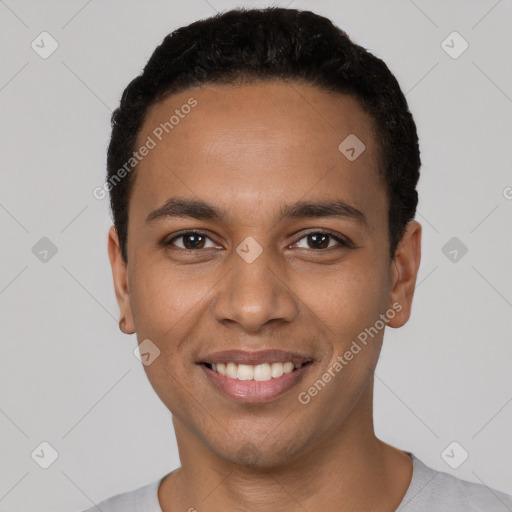 Joyful latino young-adult male with short  black hair and brown eyes