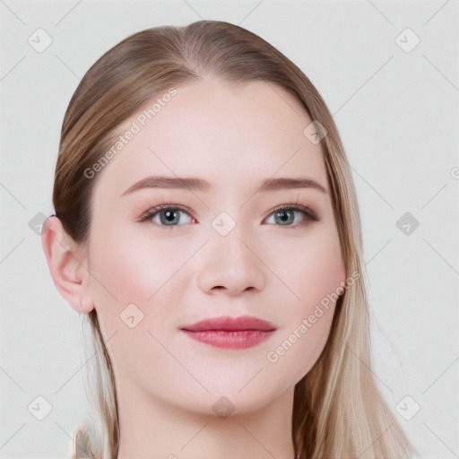 Joyful white young-adult female with long  brown hair and blue eyes