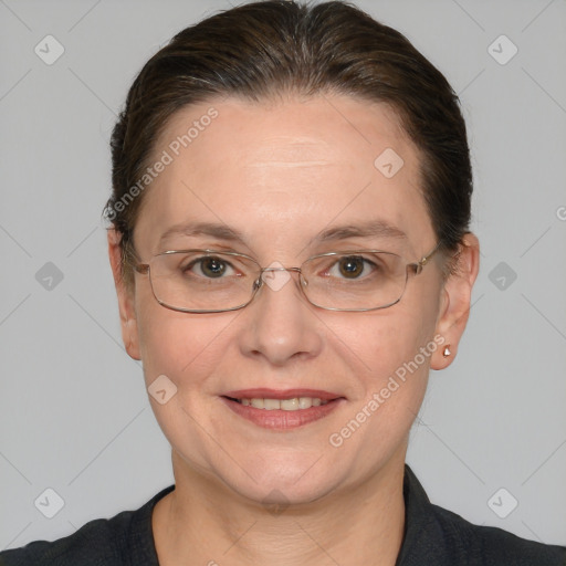 Joyful white adult female with short  brown hair and grey eyes