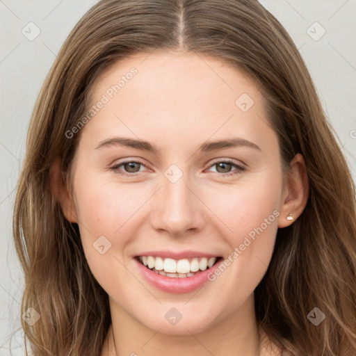 Joyful white young-adult female with long  brown hair and grey eyes