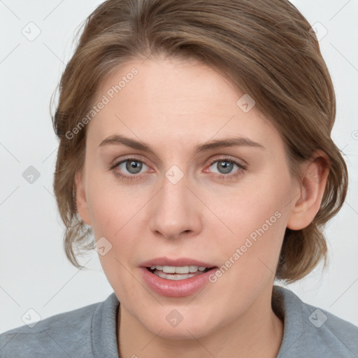 Joyful white young-adult female with medium  brown hair and blue eyes