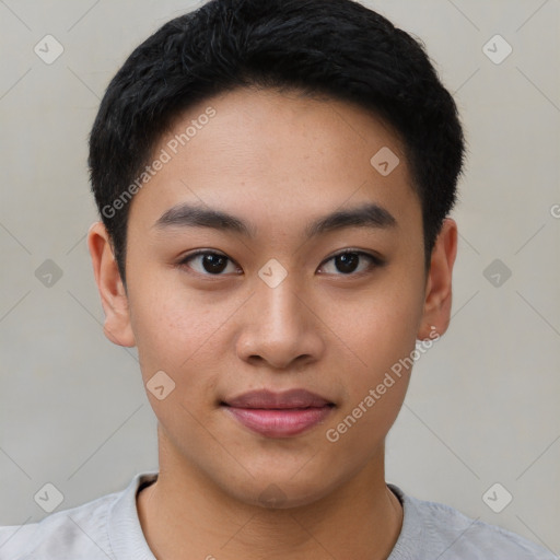 Joyful asian young-adult male with short  black hair and brown eyes