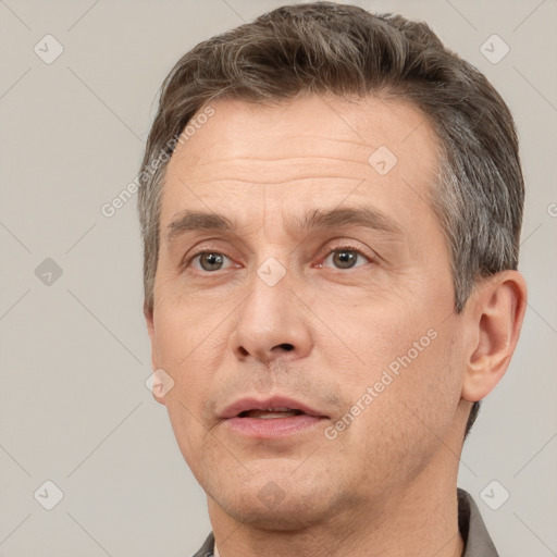 Neutral white adult male with short  brown hair and brown eyes