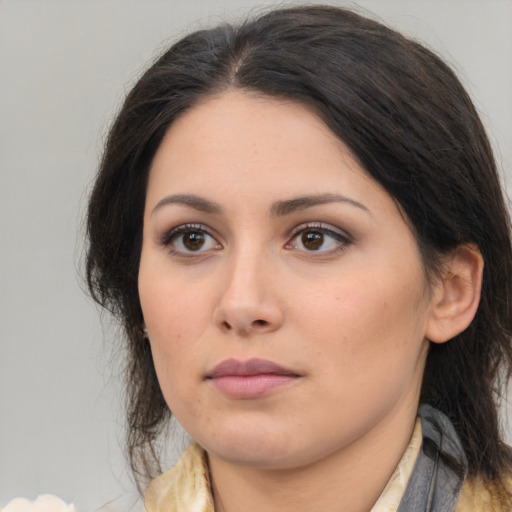 Neutral latino young-adult female with medium  brown hair and brown eyes