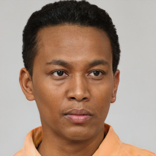 Neutral black young-adult male with short  black hair and brown eyes