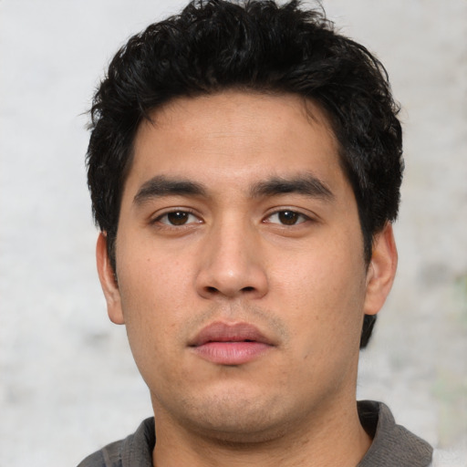 Neutral asian young-adult male with short  black hair and brown eyes