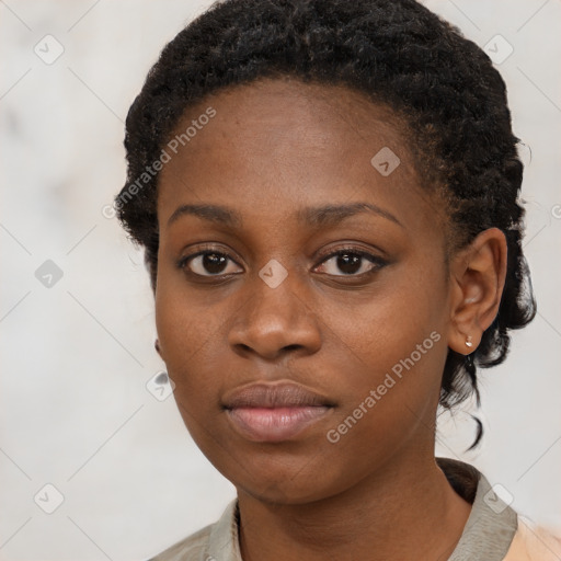 Neutral black young-adult female with short  brown hair and brown eyes