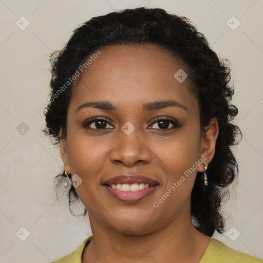 Joyful black young-adult female with medium  black hair and brown eyes