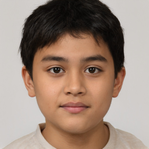 Neutral latino child male with short  brown hair and brown eyes