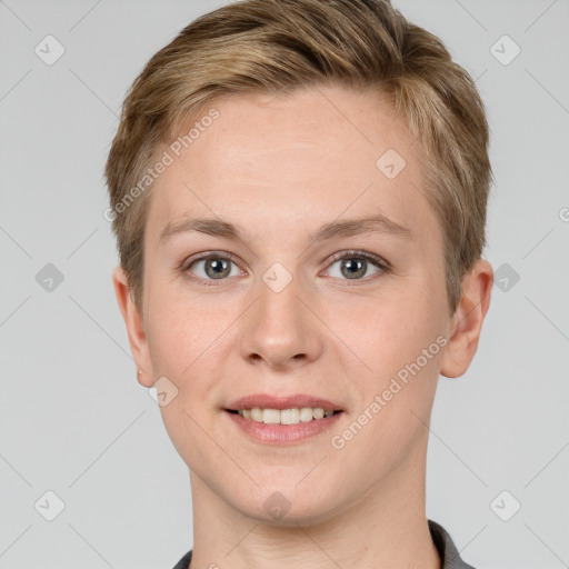 Joyful white young-adult female with short  brown hair and grey eyes