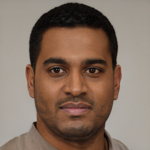 Neutral black young-adult male with short  brown hair and brown eyes