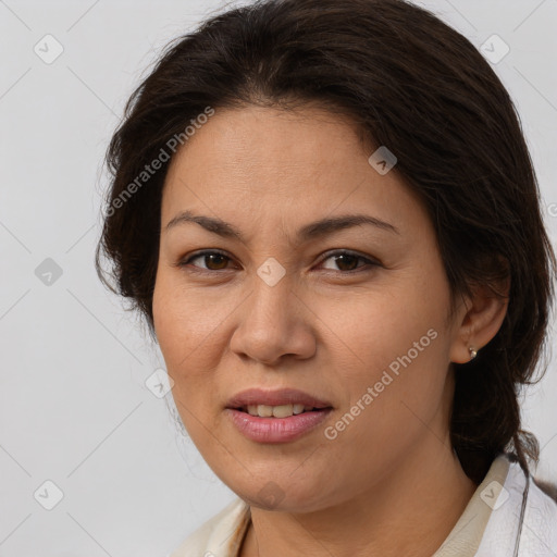 Joyful white adult female with medium  brown hair and brown eyes