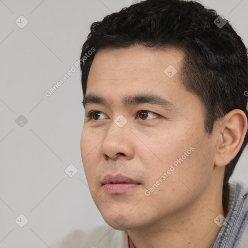 Neutral white young-adult male with short  black hair and brown eyes