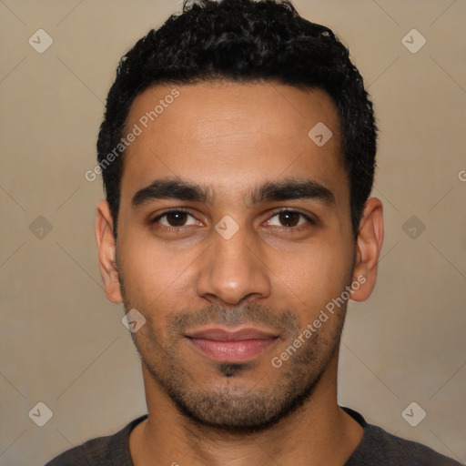 Joyful latino young-adult male with short  black hair and brown eyes