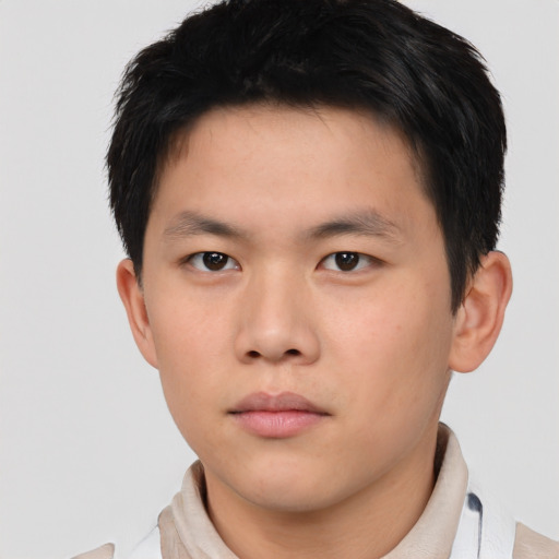 Neutral asian young-adult male with short  brown hair and brown eyes