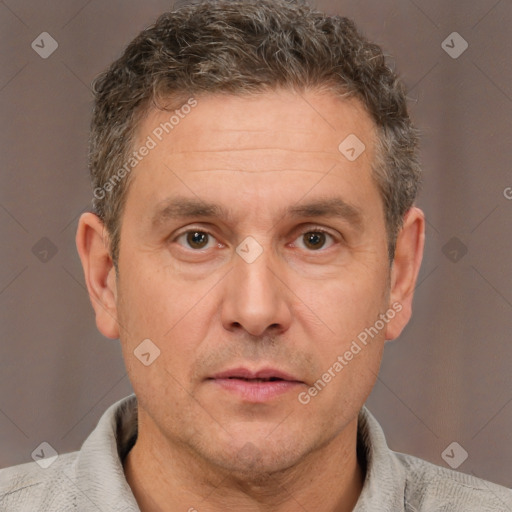 Neutral white adult male with short  brown hair and brown eyes