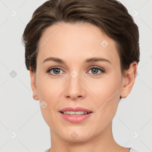 Joyful white young-adult female with short  brown hair and brown eyes