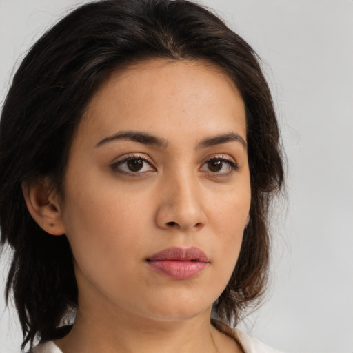 Neutral asian young-adult female with medium  brown hair and brown eyes