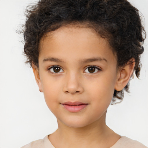 Joyful white child female with short  brown hair and brown eyes