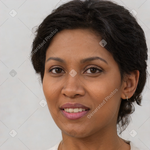 Joyful latino young-adult female with short  brown hair and brown eyes