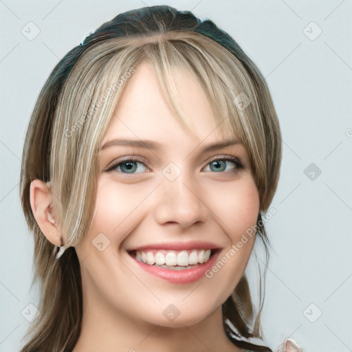 Joyful white young-adult female with long  brown hair and blue eyes