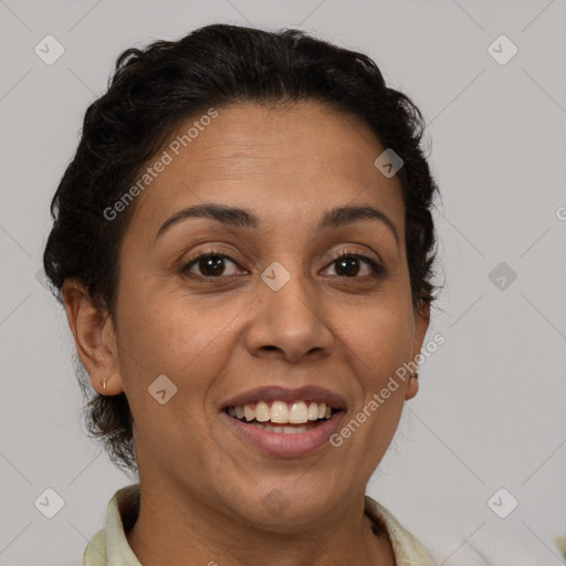 Joyful white adult female with short  brown hair and brown eyes