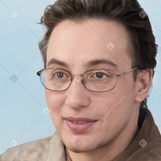 Joyful white adult male with short  brown hair and grey eyes