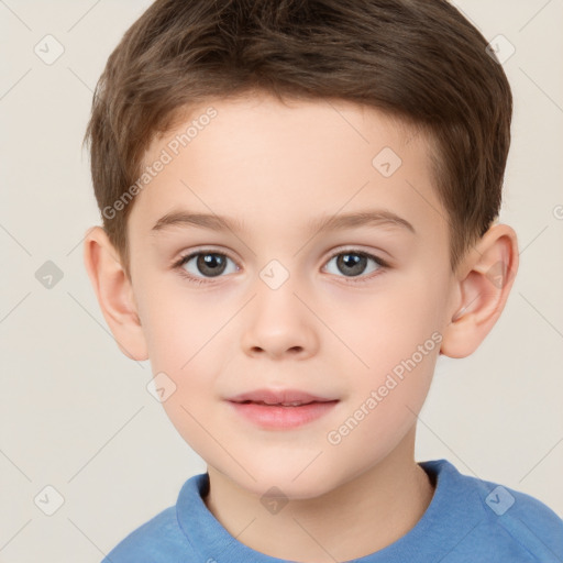 Joyful white child male with short  brown hair and brown eyes