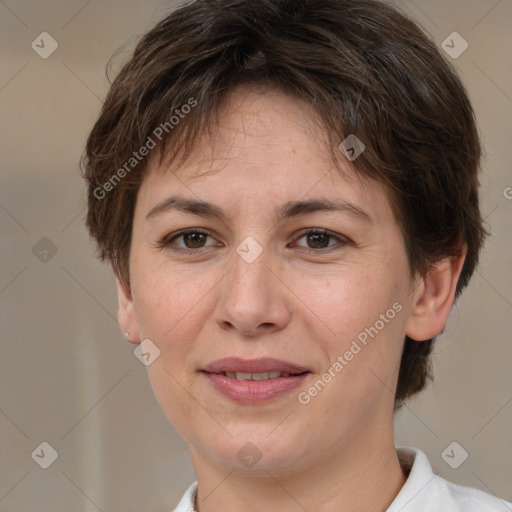 Joyful white adult female with medium  brown hair and brown eyes