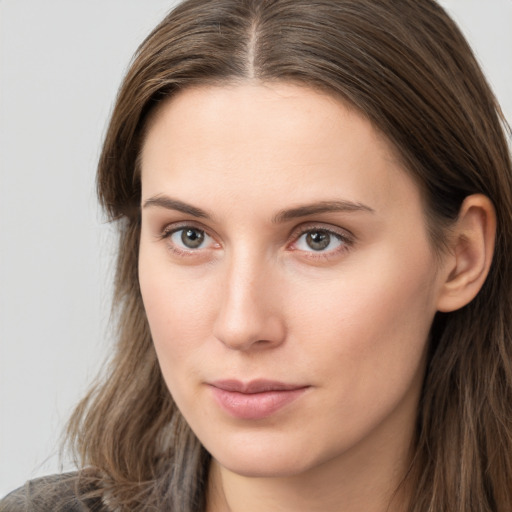 Neutral white young-adult female with long  brown hair and grey eyes