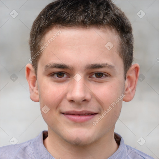 Joyful white child male with short  brown hair and brown eyes