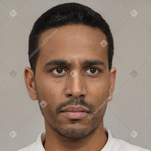 Neutral latino young-adult male with short  black hair and brown eyes