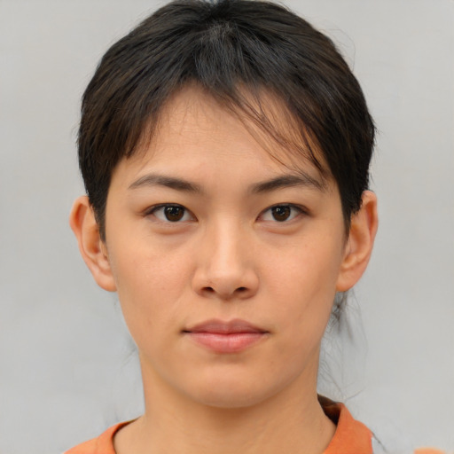 Neutral asian young-adult female with medium  brown hair and brown eyes