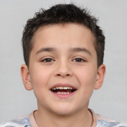 Joyful white child male with short  brown hair and brown eyes