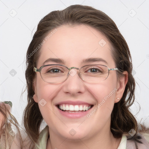 Joyful white young-adult female with medium  brown hair and blue eyes