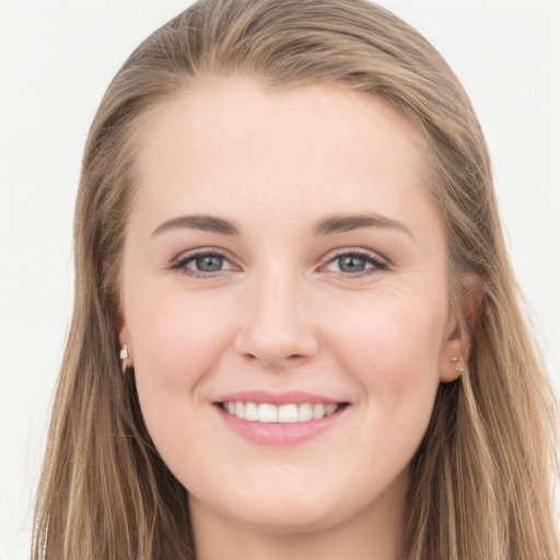 Joyful white young-adult female with long  brown hair and grey eyes