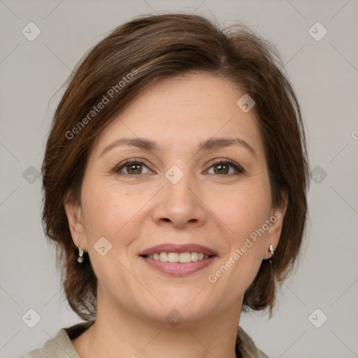 Joyful white adult female with medium  brown hair and brown eyes