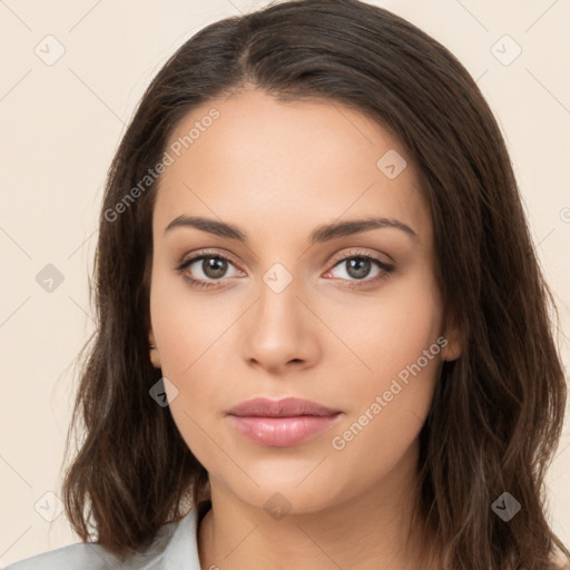 Neutral white young-adult female with long  brown hair and brown eyes