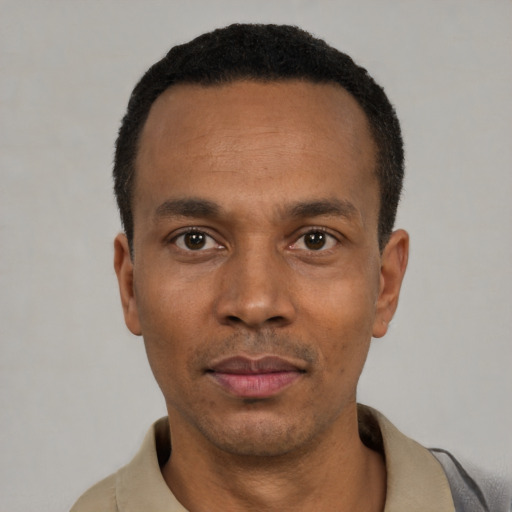Neutral latino adult male with short  black hair and brown eyes