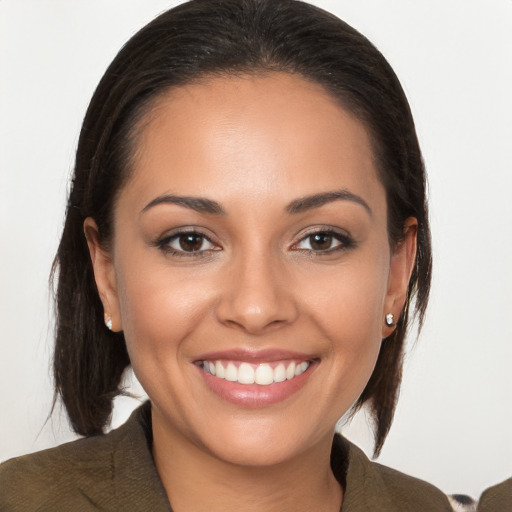 Joyful white young-adult female with medium  brown hair and brown eyes