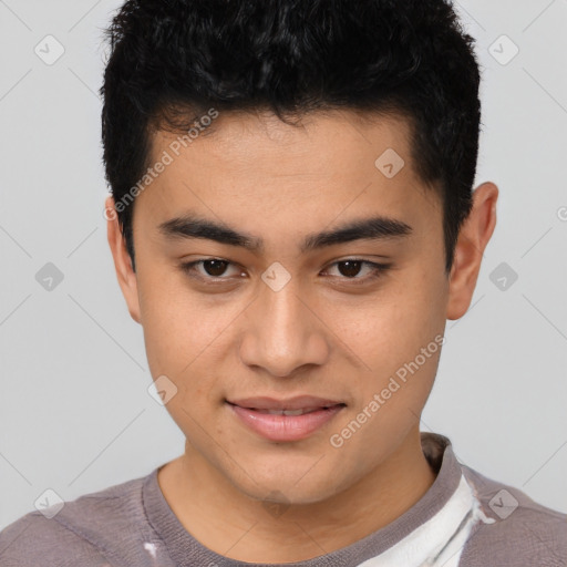 Joyful asian young-adult male with short  brown hair and brown eyes