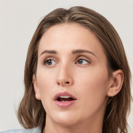 Neutral white young-adult female with medium  brown hair and grey eyes