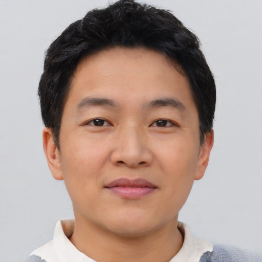 Neutral asian young-adult male with short  black hair and brown eyes