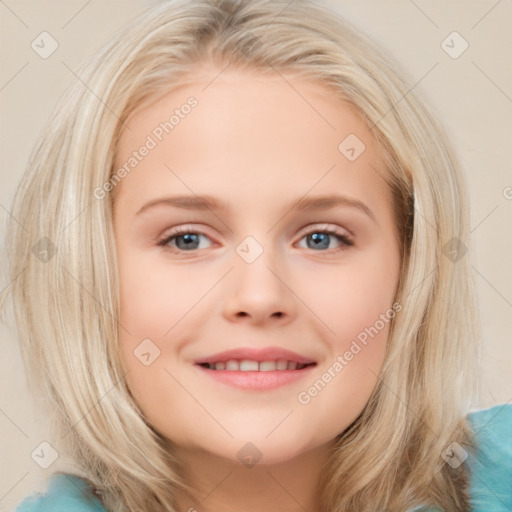 Joyful white child female with medium  brown hair and blue eyes