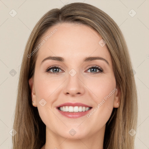 Joyful white young-adult female with long  brown hair and grey eyes