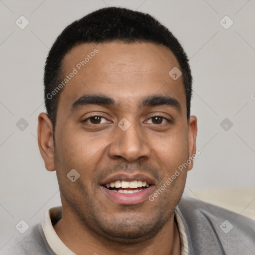 Joyful latino young-adult male with short  brown hair and brown eyes