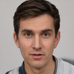 Neutral white adult male with short  brown hair and brown eyes