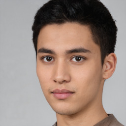 Neutral white young-adult male with short  black hair and brown eyes