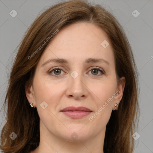 Joyful white adult female with medium  brown hair and grey eyes