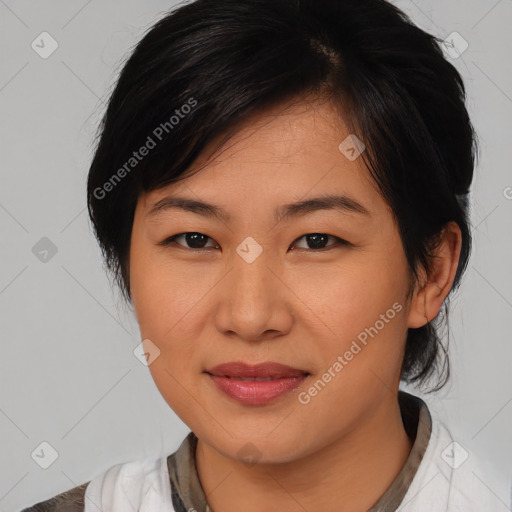 Joyful asian young-adult female with medium  black hair and brown eyes